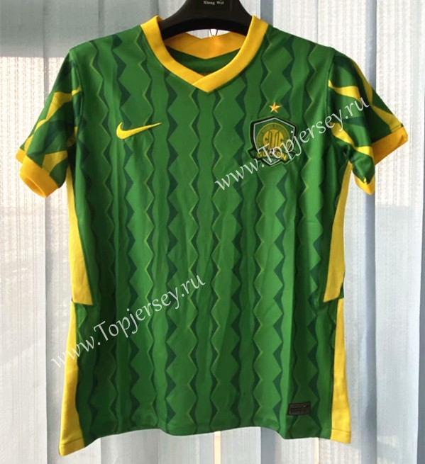 green and gold soccer jersey